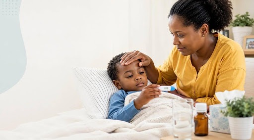 A mother checking her child for a fever. Photo credit - AI Generated